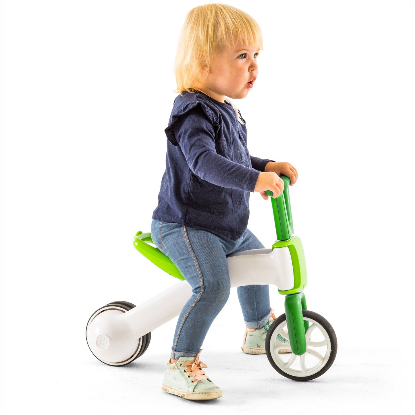 girl riding Chillafish BUNZI Trike Lime