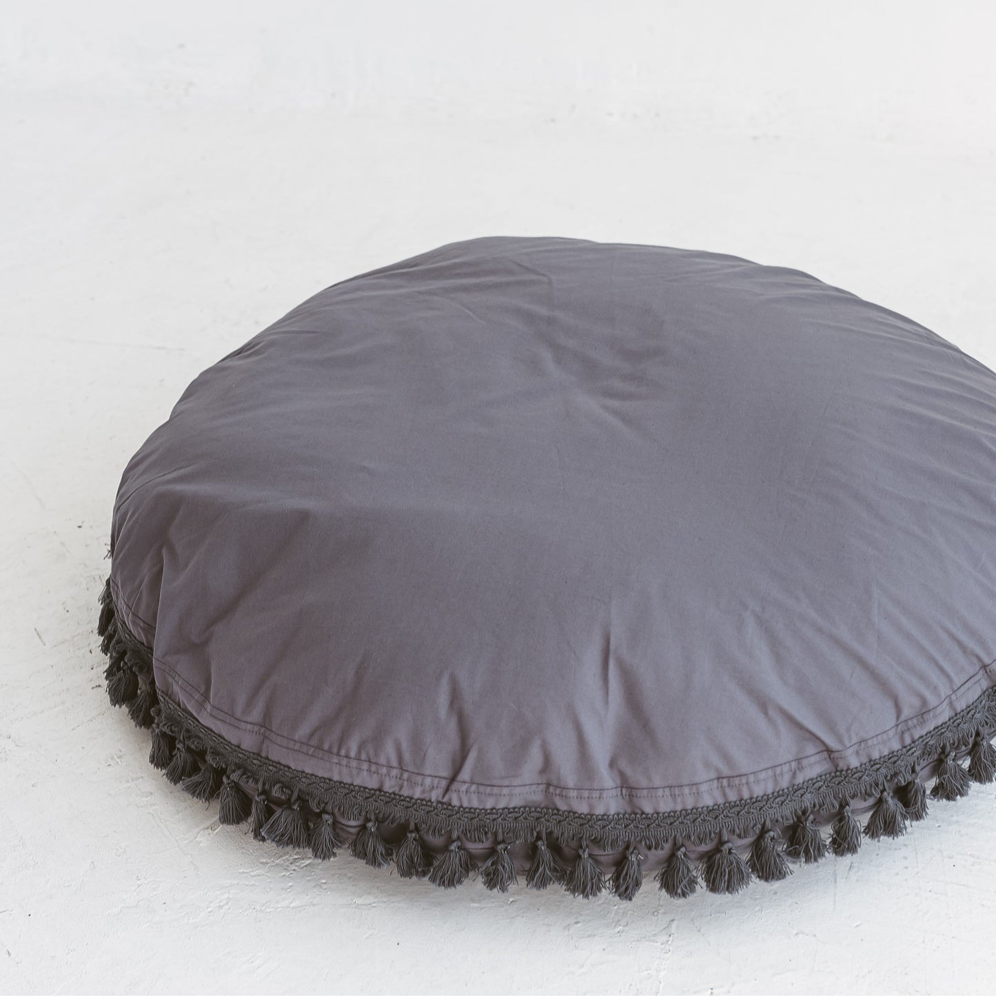 MINICAMP Large Floor Cushion with Tassels in Grey