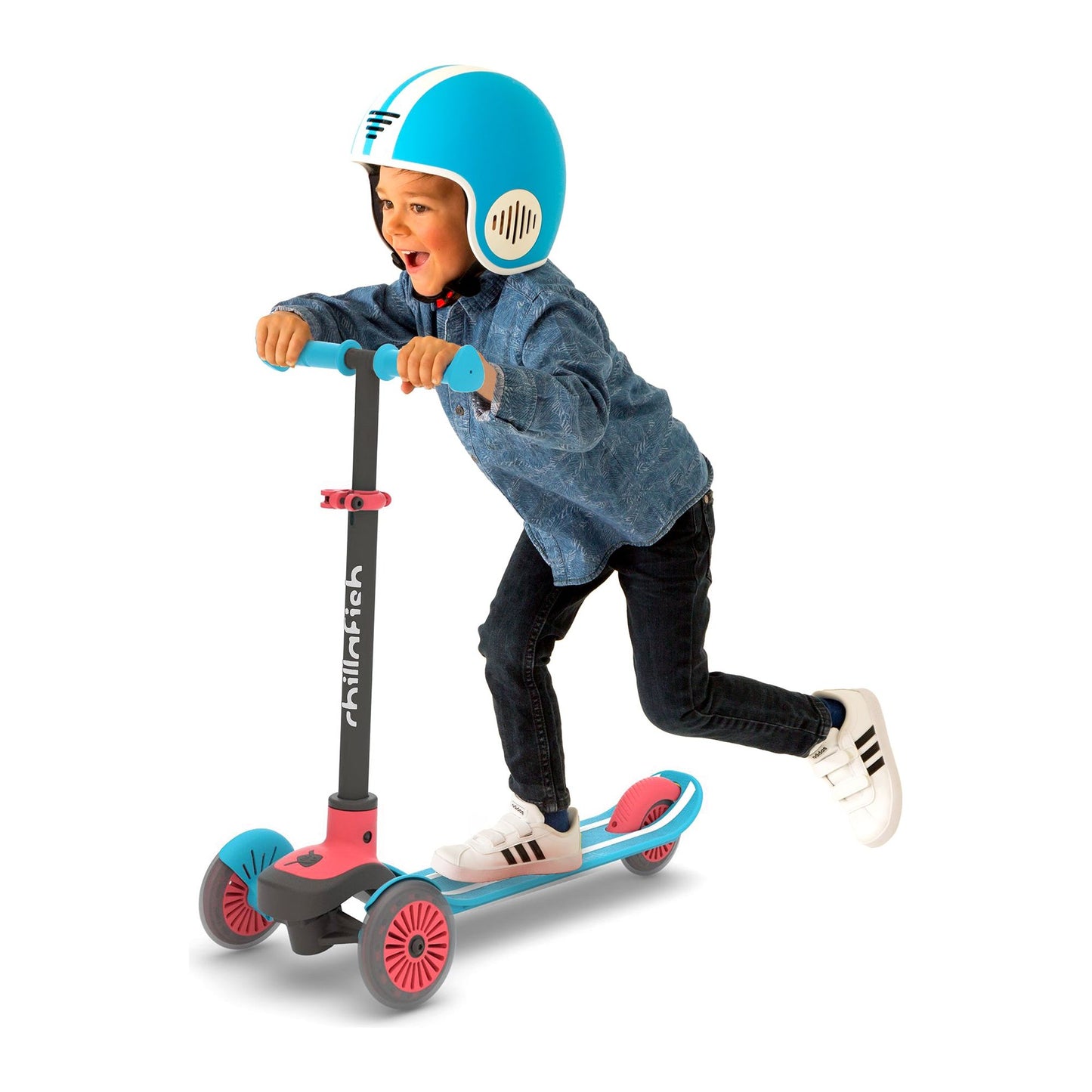 smiling boy riding Chillafish Scotti Scooter Blue