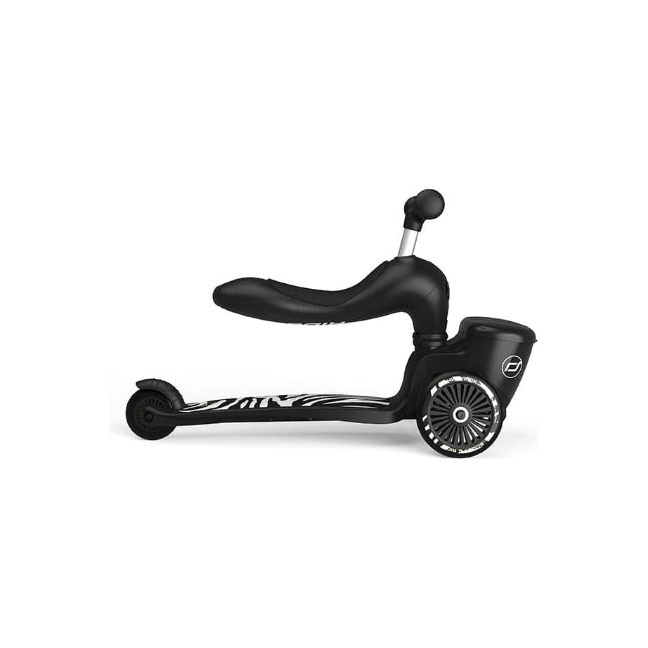Scoot and Ride Highwaykick 1 Lifestyle Scooter - Zebra in seated position right side