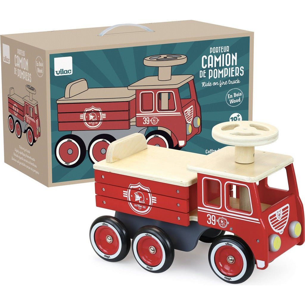 Vilac Ride-On Wooden Firetruck beside box