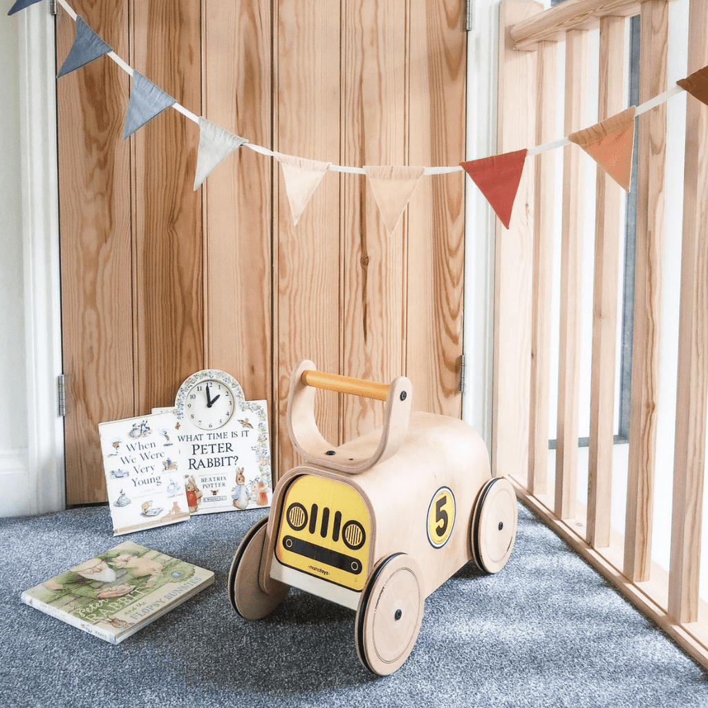 Mama Toyz Racer Ride-On - 10+ months in playroom with books