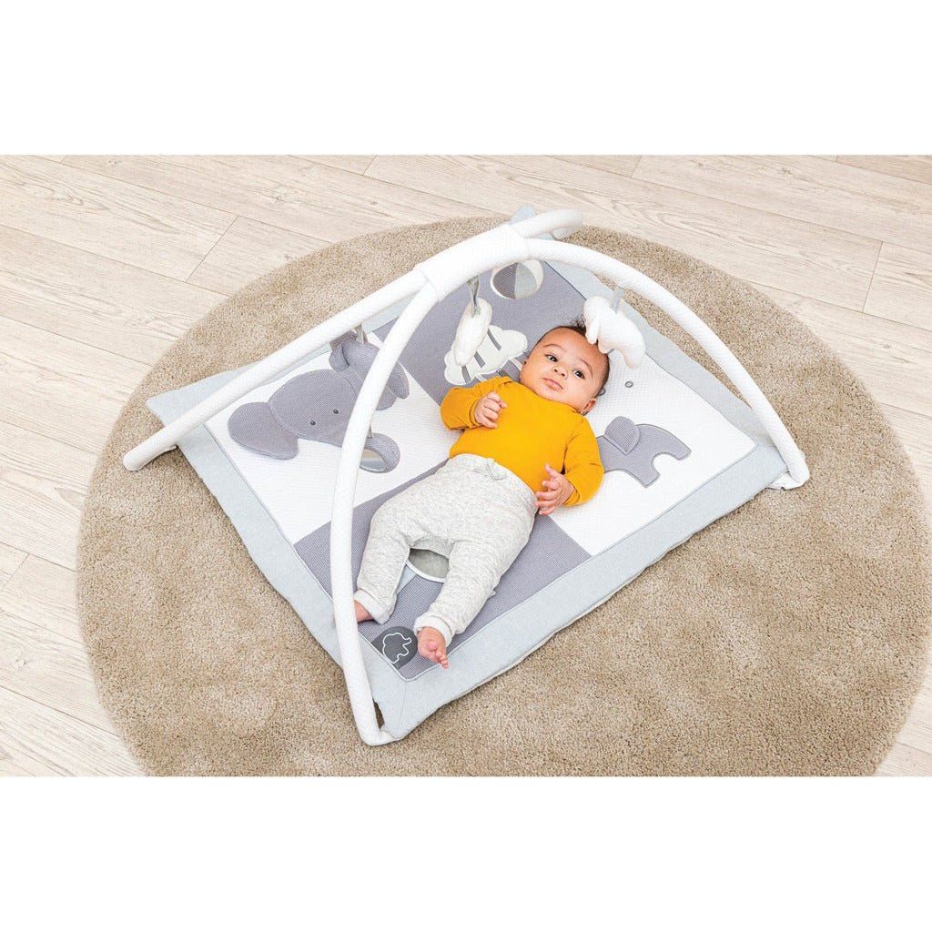 baby lying on back on Nattou Baby Playmat - Tembo Elephant