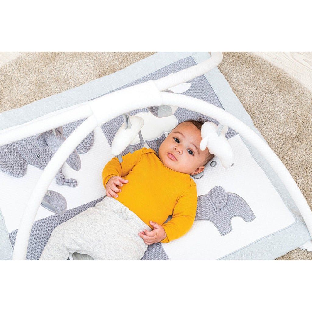 close up of baby lying on back on Nattou Baby Playmat - Tembo Elephant