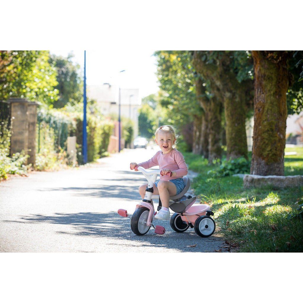 girl riding pink Smoby Baby Balade Trike