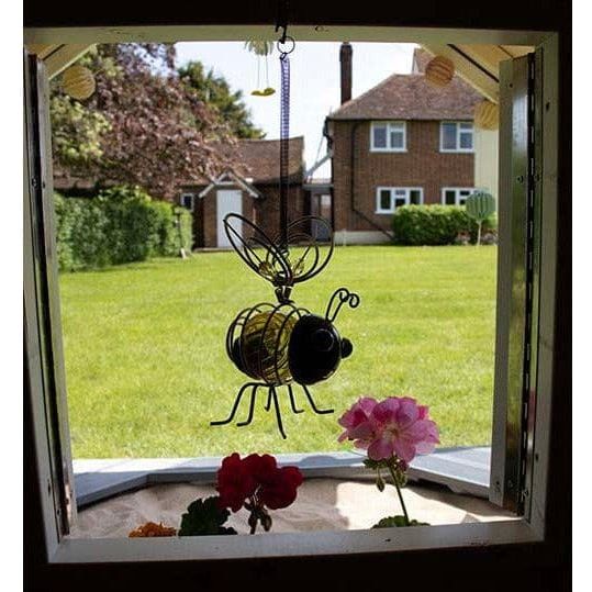 Little Rascals Benji Wooden Playhouse with Sandpit with bee hanging from window