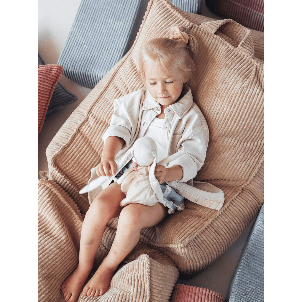 girl lying on Wigiwama Brown Sugar Beanbag Chair