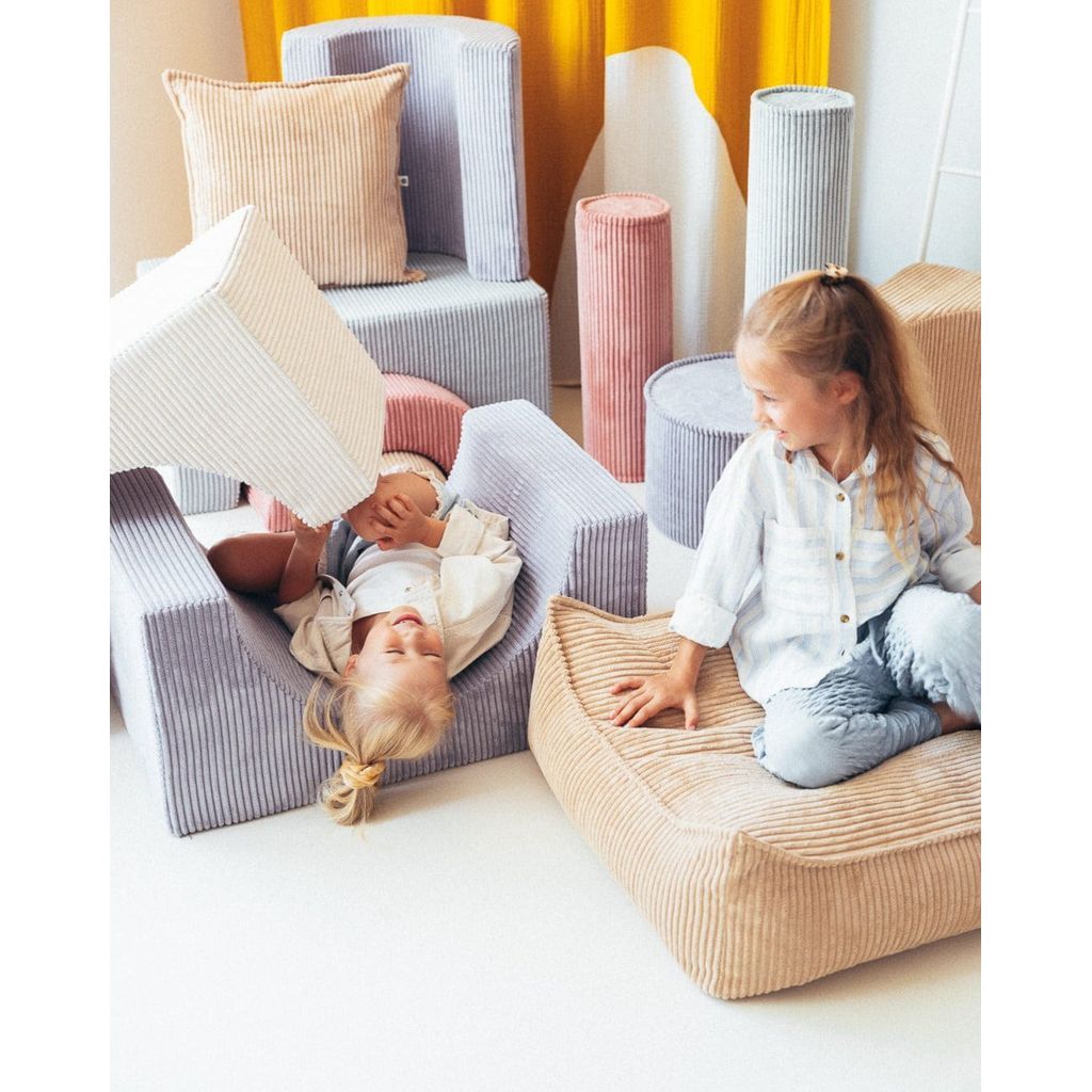 girls sitting on Wigiwama Blueberry Blue Rainbow Softplay Set in playroom