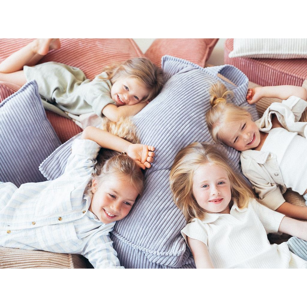 4 girls lying on Wigiwama Blueberry Blue Beanbag Chair