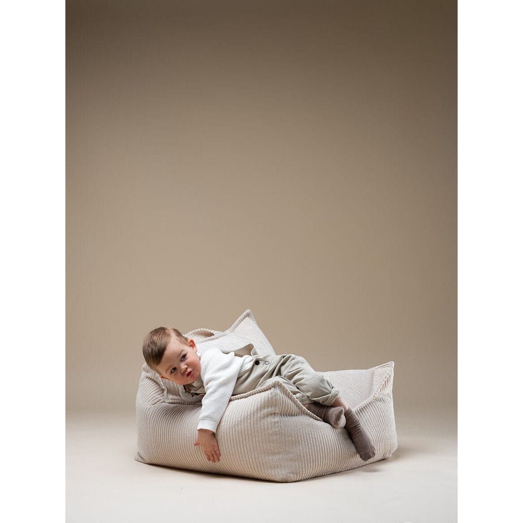 boy lying across Wigiwama Marshmallow Beanbag Chair