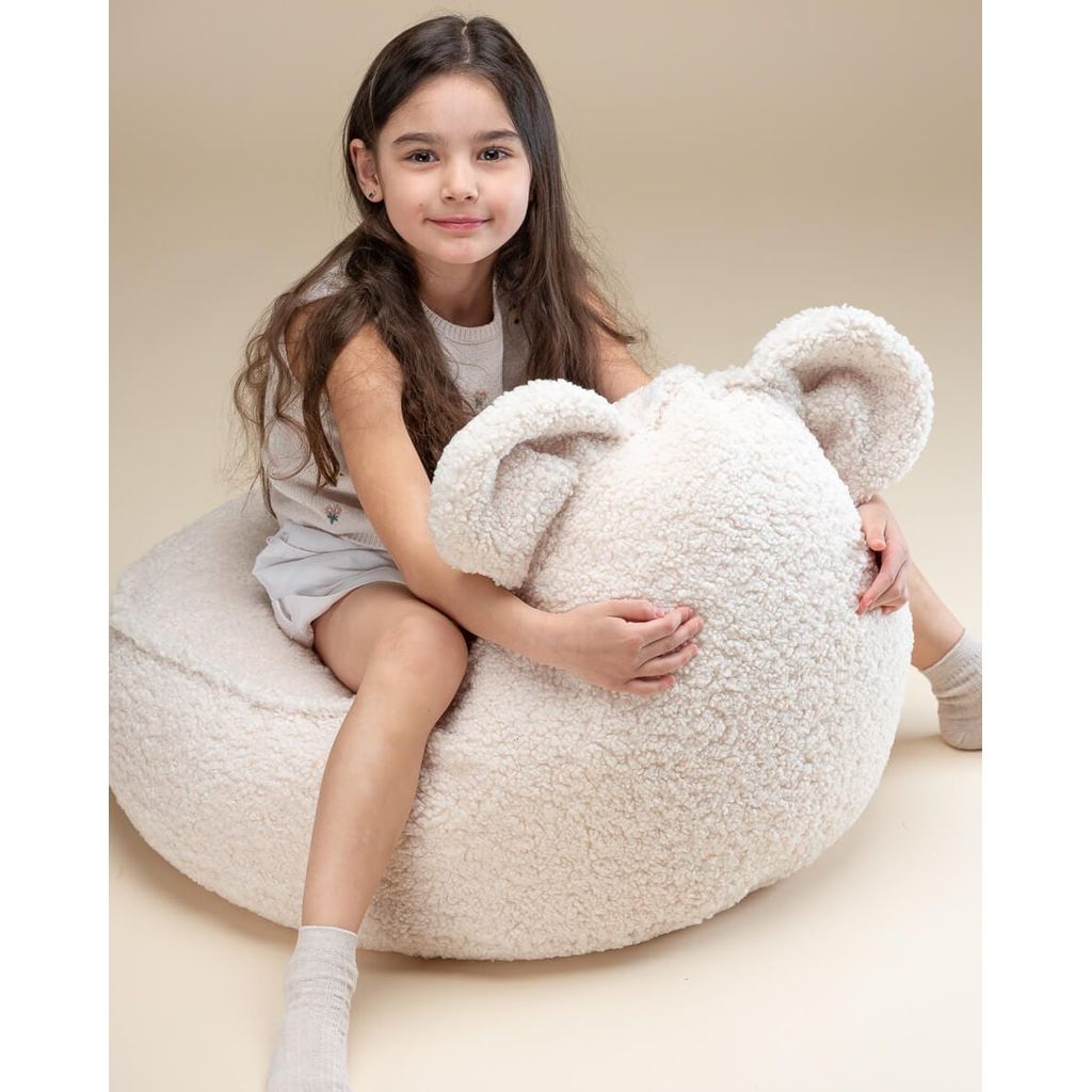 girl sitting on Wigiwama Cream White Bear Beanbag