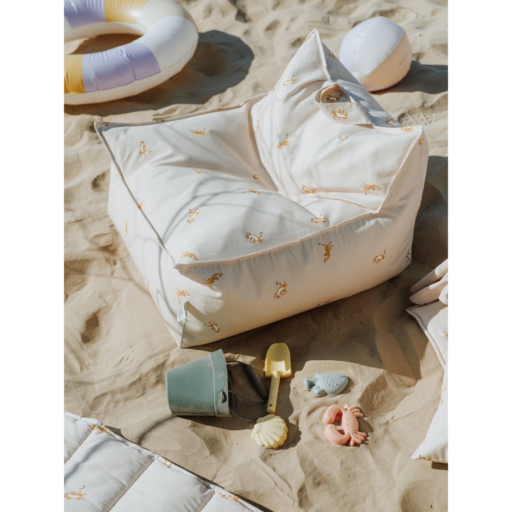 Wigiwama Beige Tiger Beanbag Chair on the beach