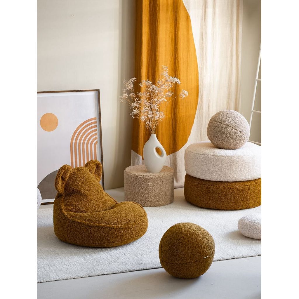 Wigiwama Maple Ball Cushion next to bear beanbag chair
