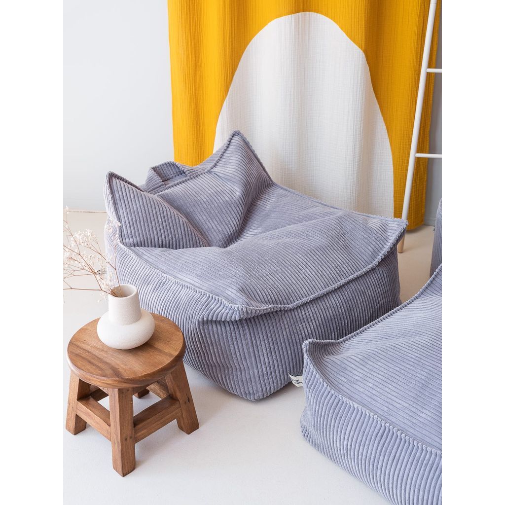 Wigiwama Blueberry Blue Beanbag Chair next to side table