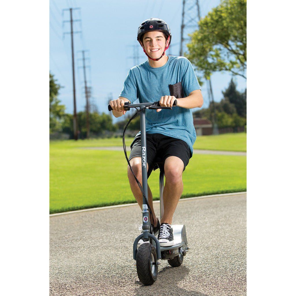 boy sitting on Razor E300S Electric Scooter 24 Volt Scooter - Matt Grey