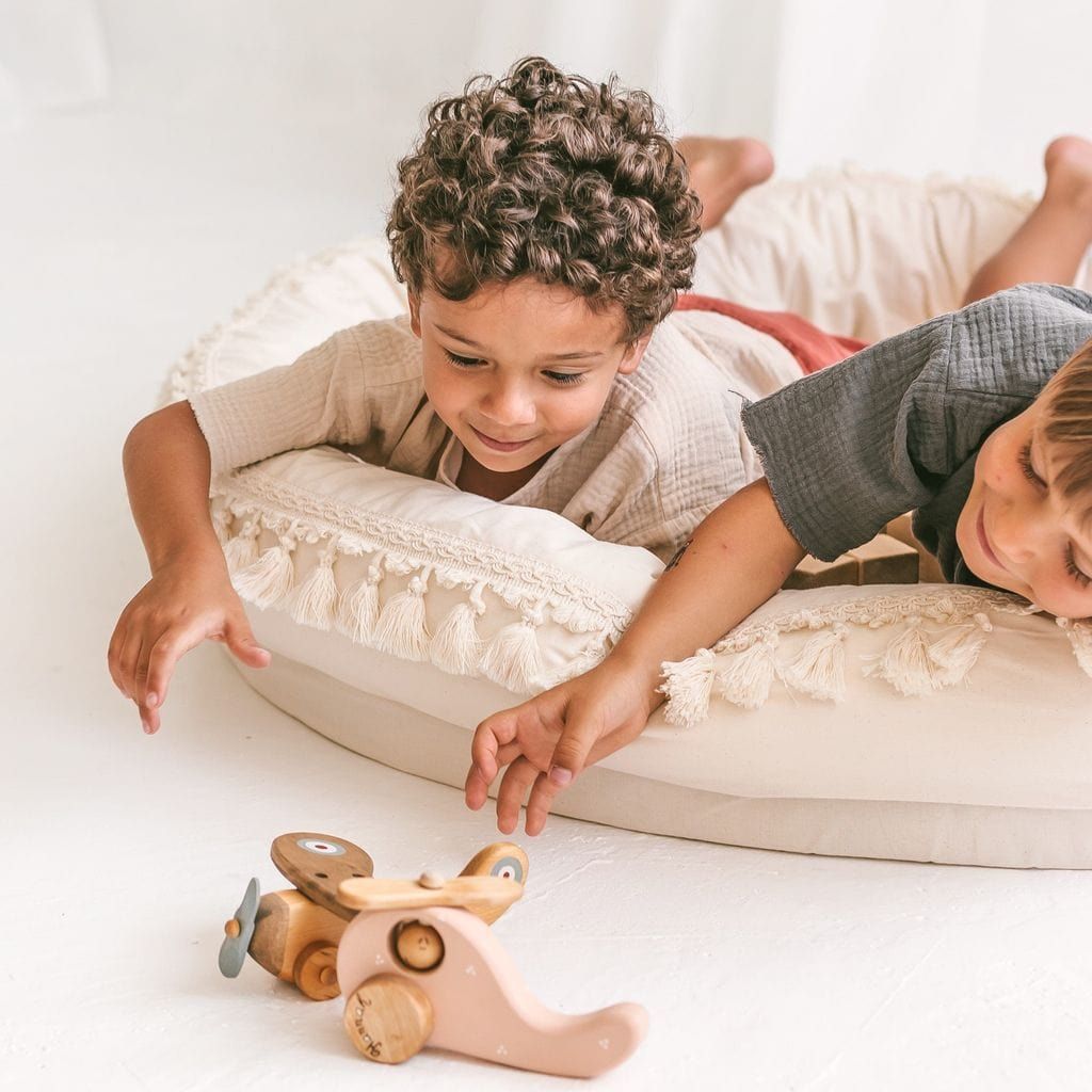 clsoe up of boy lying in MINICAMP Large Play & Rest Kids Lounger