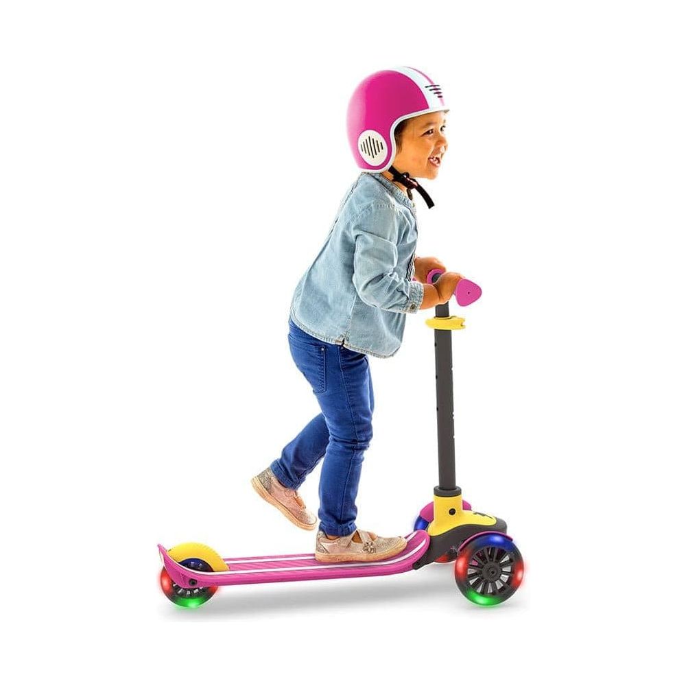 boy riding Chillafish Scotti Glow Scooter in Pink