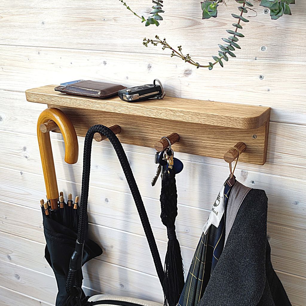 MINICAMP Floating Kids Bookshelf With Coat Hooks Made of Solid Oak close up