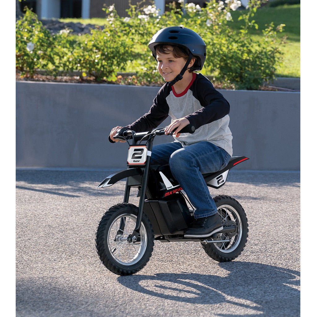 boy riding Razor Dirt Rocket MX125 - Black