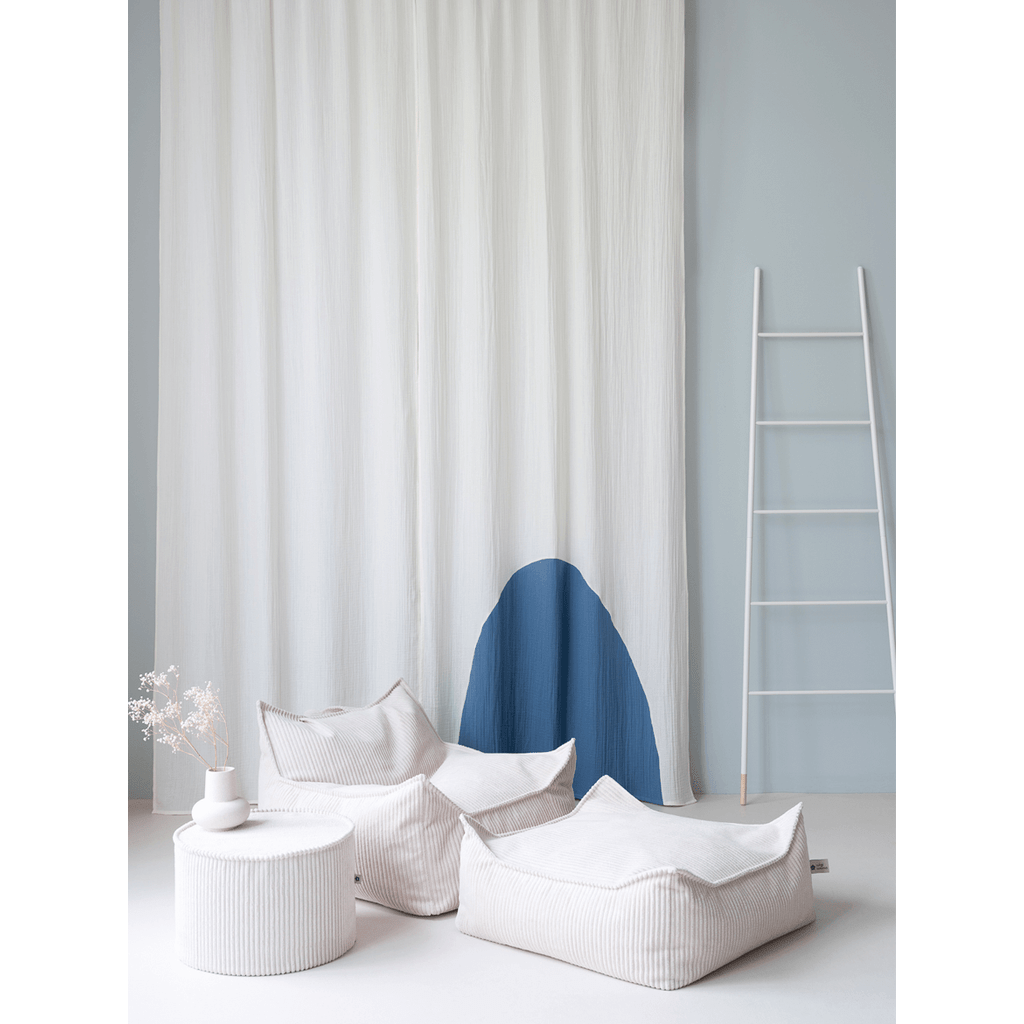 Wigiwama Marshmallow Beanbag Chair in front o drape