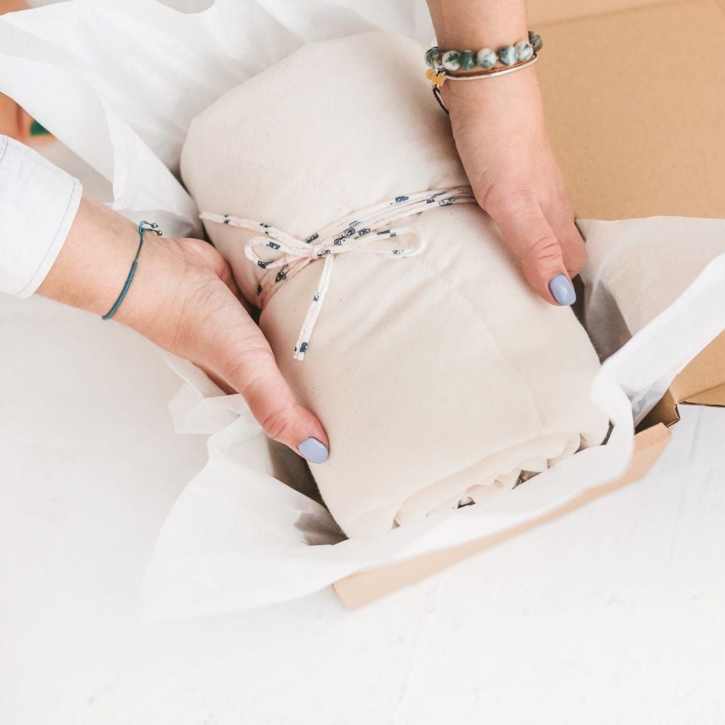 MINICAMP Kids Playmat With Grey Pompom Border folded in box