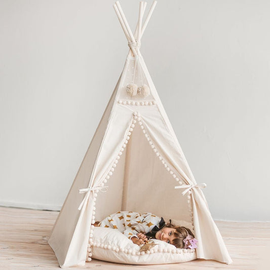 girl lying in MINICAMP Original Play Tent With Pompoms