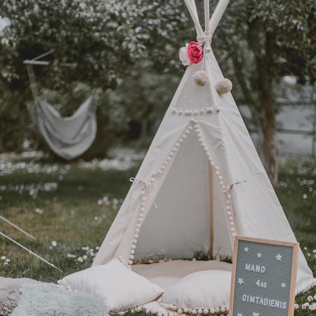 MINICAMP Original Play Tent With Pompoms with sign outside in garden