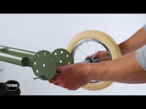 man demonstrating TryBike - Steel 2 in 1 Balance Trike Bike - Vintage Green