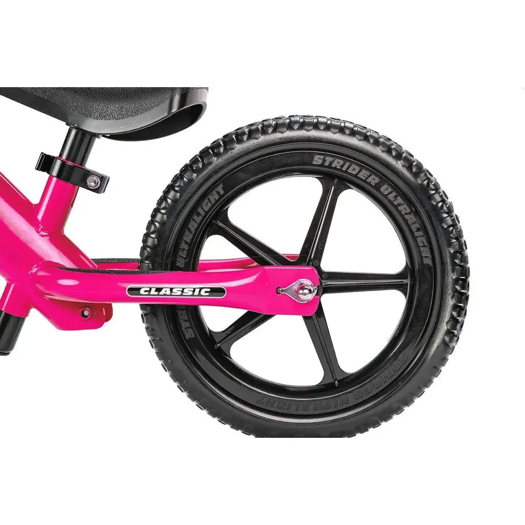 Strider Classic 12 inch Balance Bike - Pink rear wheel close up