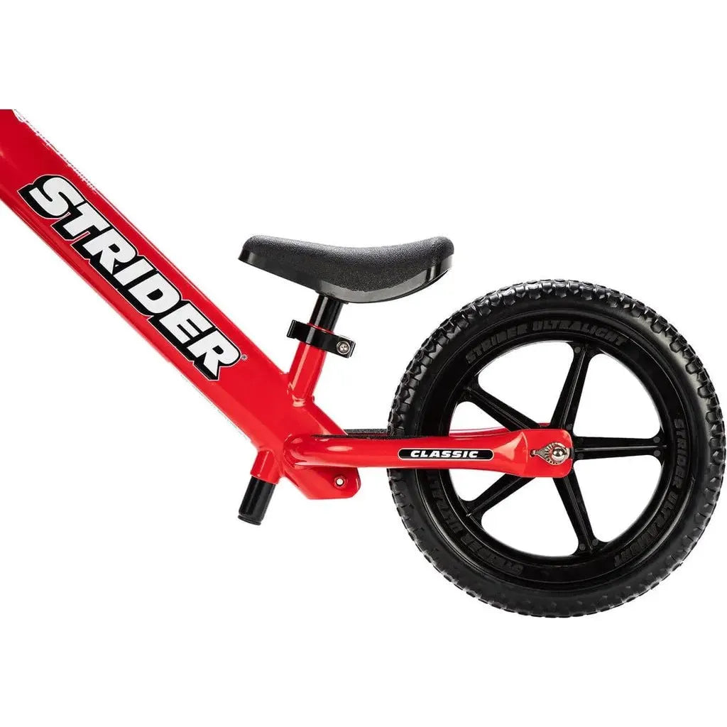 Strider Classic 12 inch Balance Bike - Red rear wheel close up