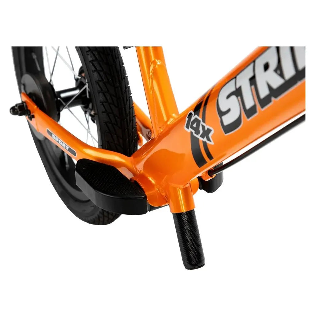 Strider 14x Balance Bike - Tangerine foot rest close up