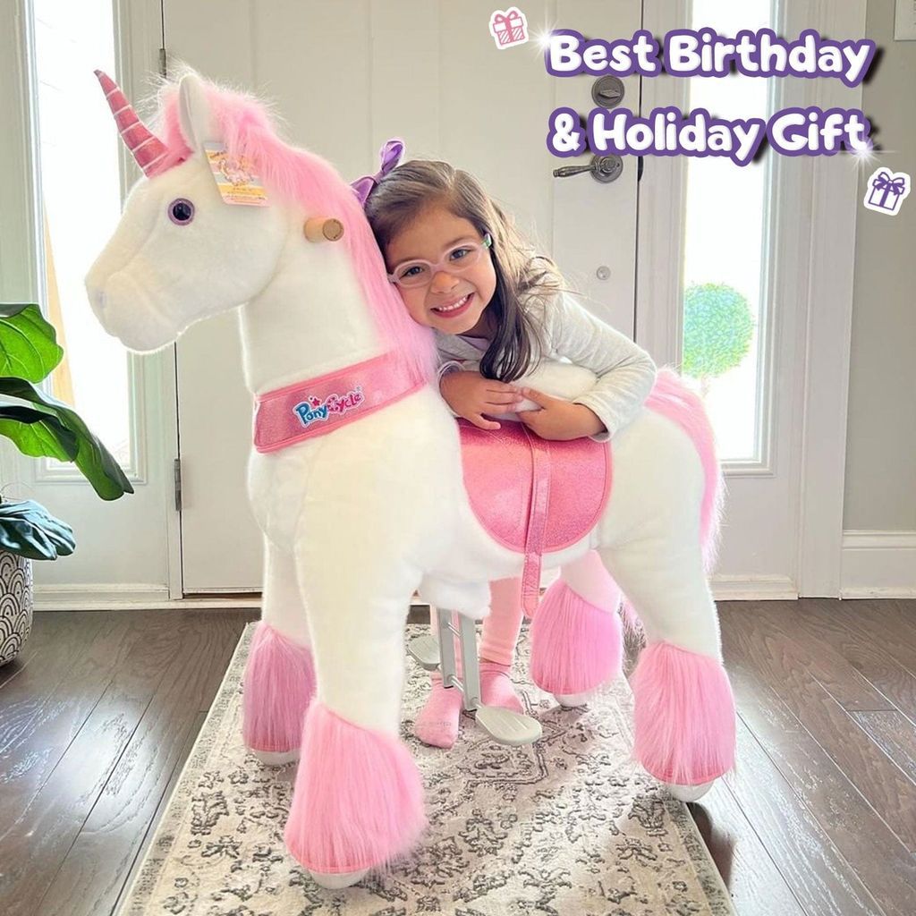 girl cuddling Ponycycle Ride-on Plush Unicorn Age 4-8 Pink
