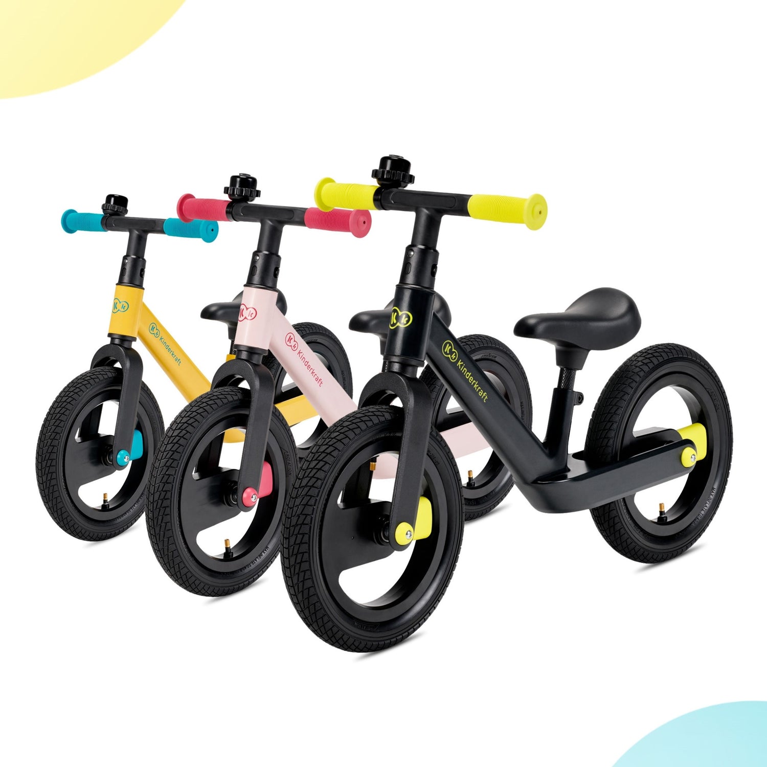 3 kinderkraft goswift balance bikes in black, pink and yellow next to each other