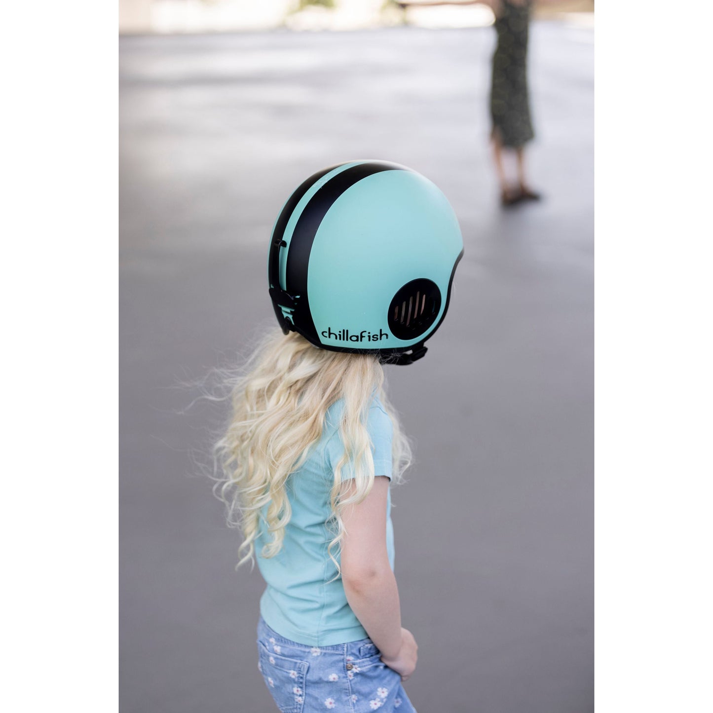 girl wearing Chillafish Kids Helmet Bobbi XS Lime