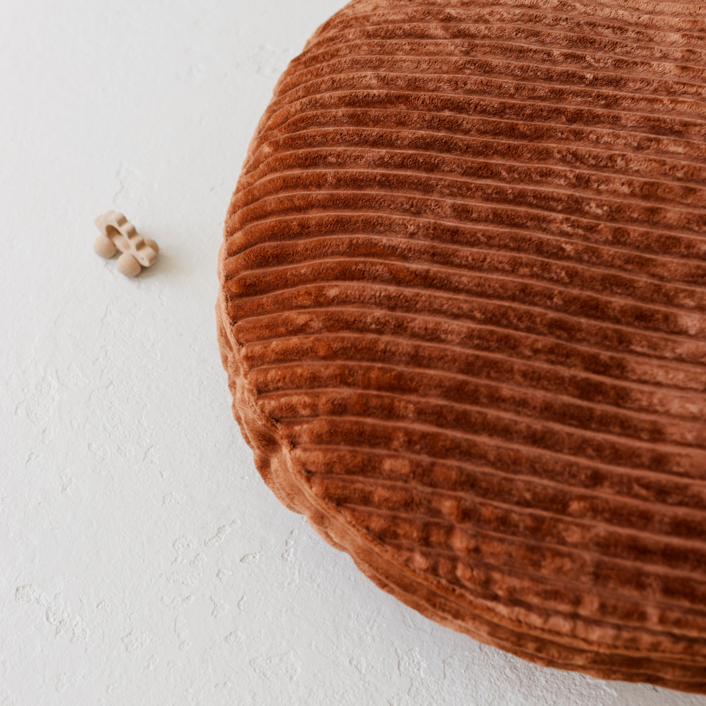MINICAMP Large Kids Floor Cushion with a terracotta corduroy cover