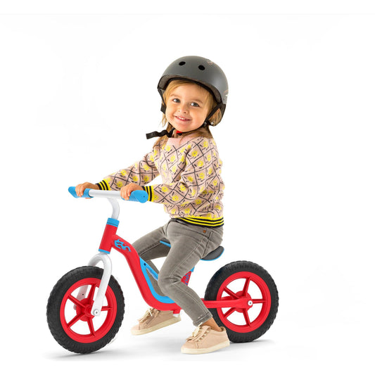 girl riding Chillafish Balance Bike Charlie Red