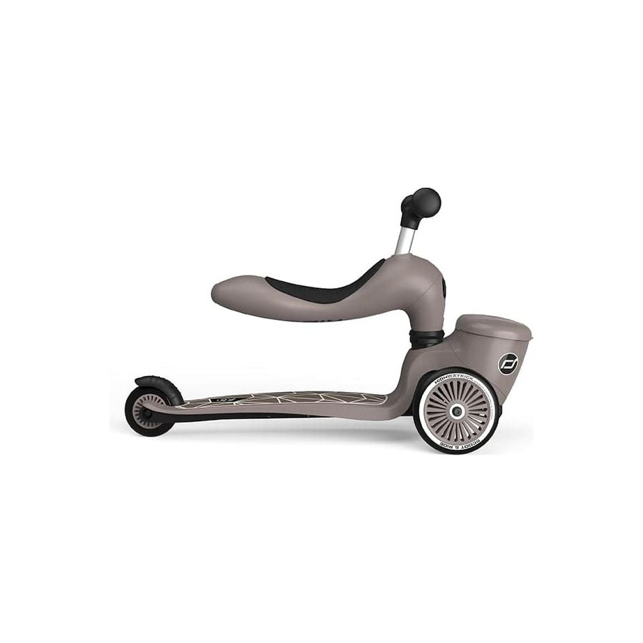 Scoot and Ride Highwaykick 1 Lifestyle Scooter- Brown Lines  in seated position right side