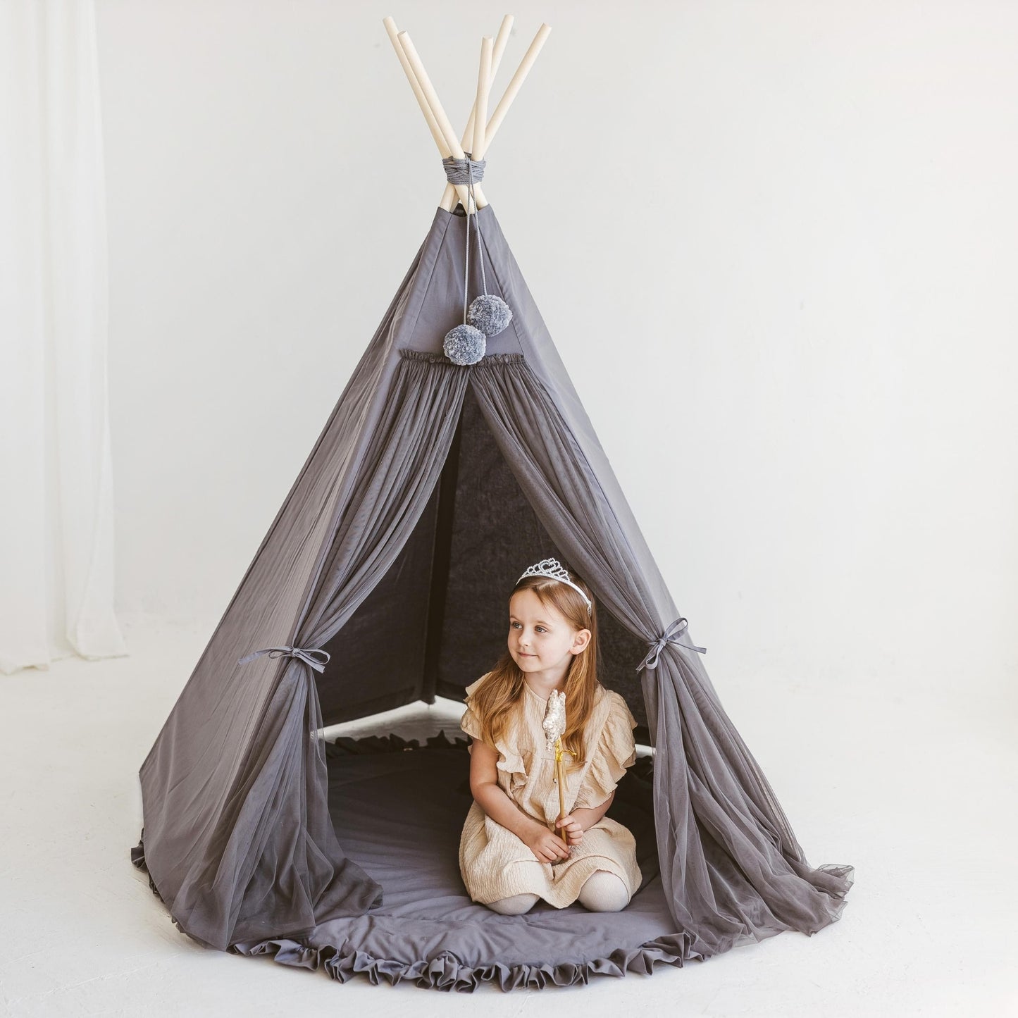 girl with wand kneeling in MINICAMP Fairy Kids Play Tent in Grey