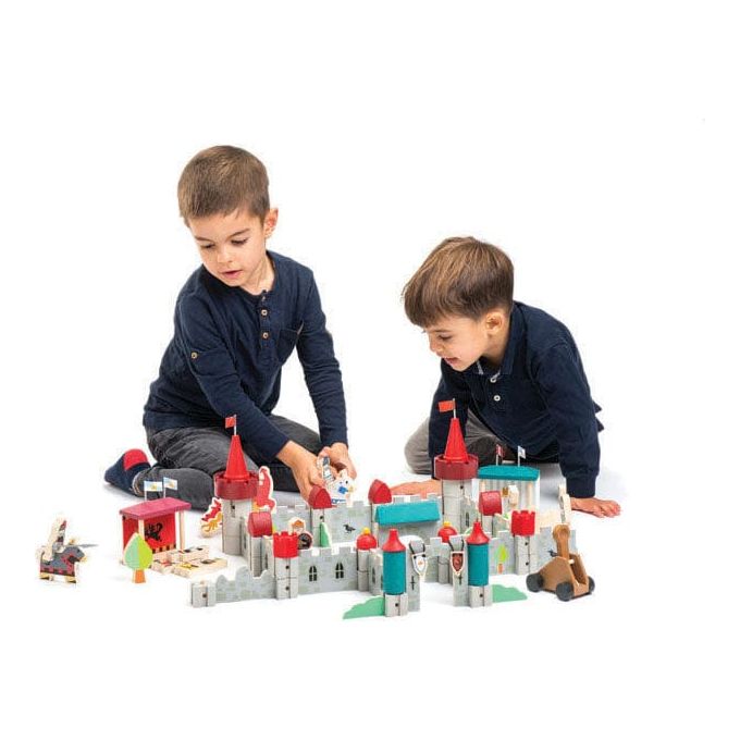 2 boys playing with Tender Leaf Royal Castle Wooden Toy