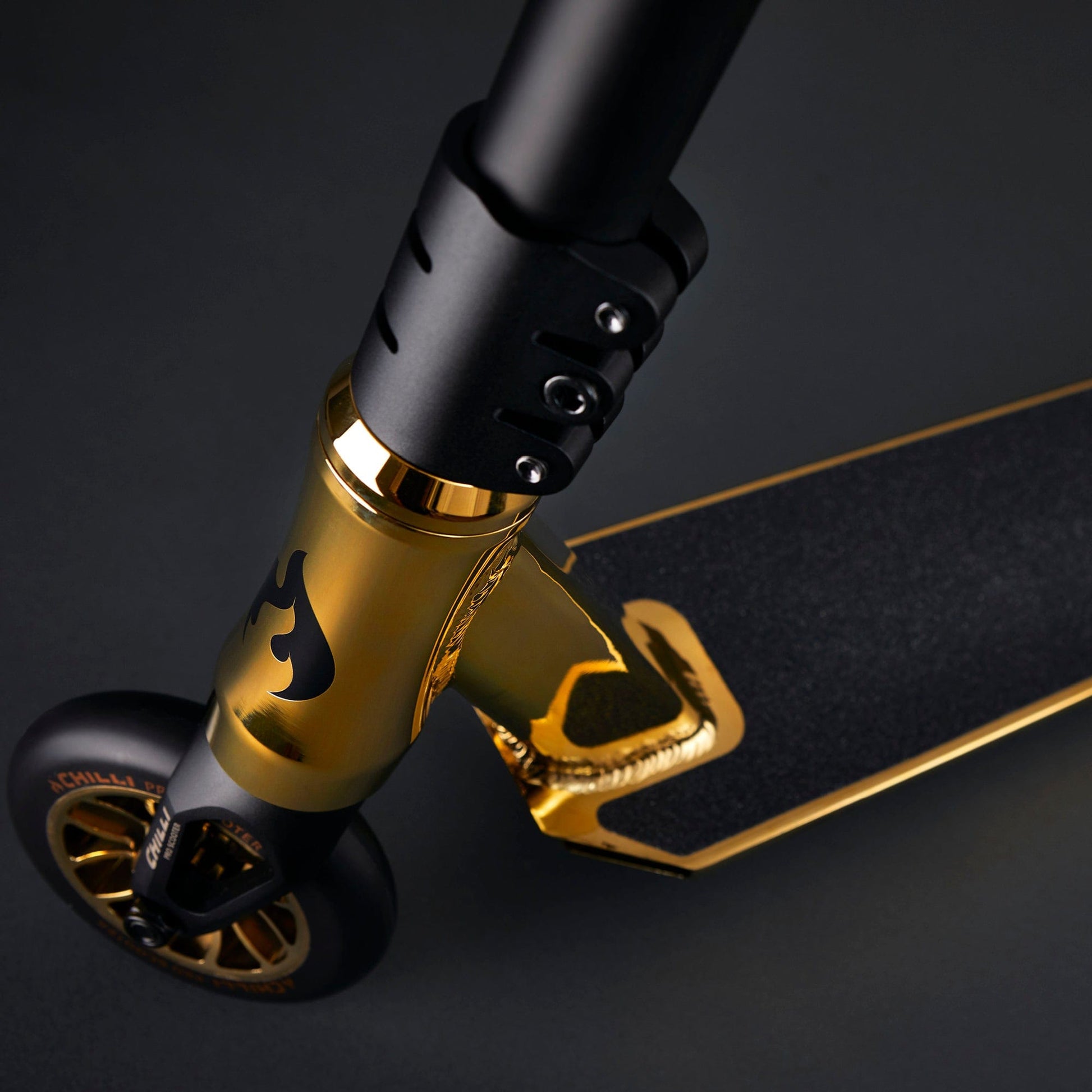 Micro Scooter Chilli Reaper - Gold handlebar stem close up