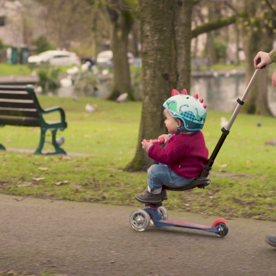 woman pushing child on Micro Scooter Mini 3-in-1 Deluxe - Blue