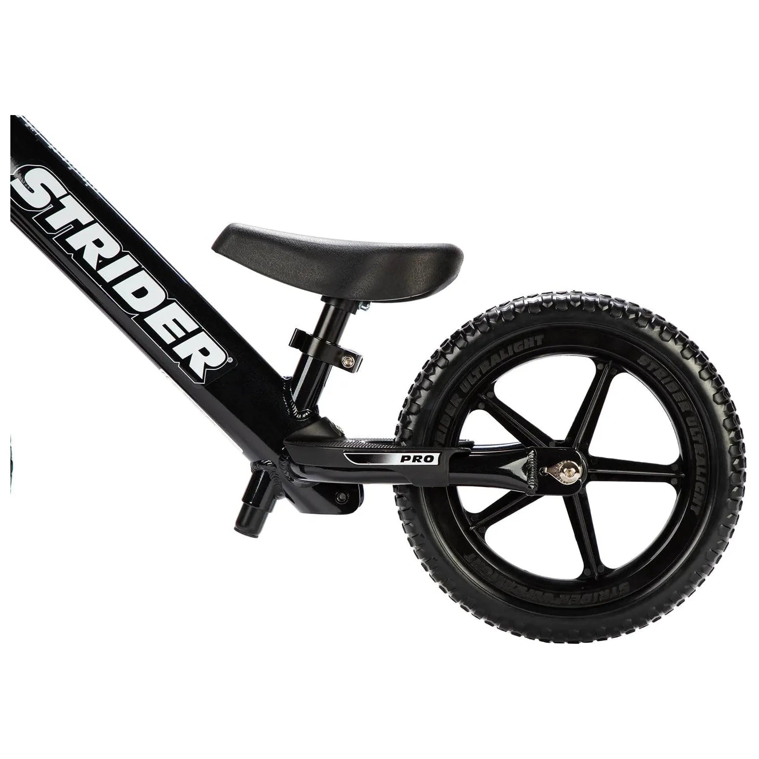 Strider Pro 12 inch Balance Bike - Black rear wheel close up