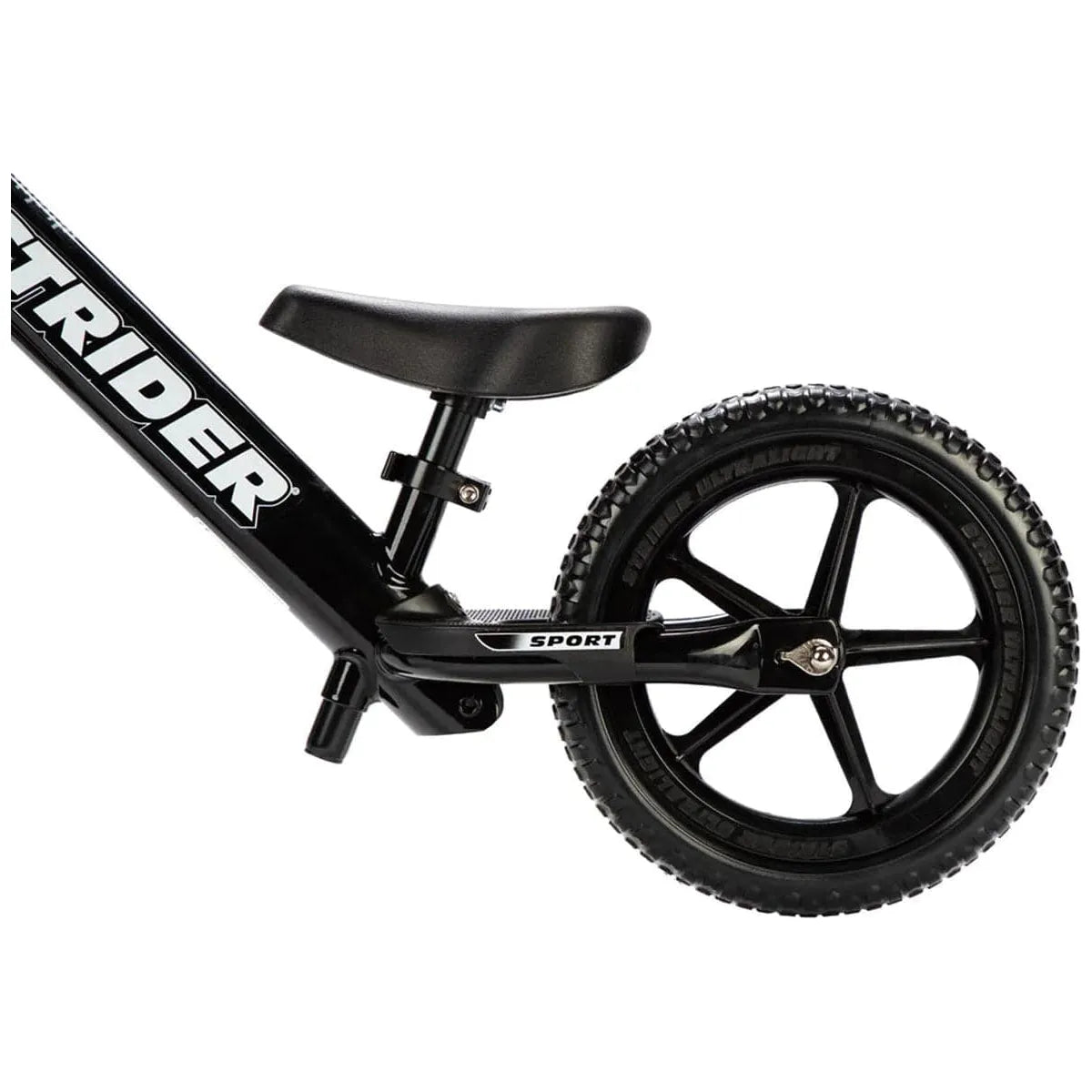 Strider Sport 12 inch Balance Bike - Black rear wheel close up