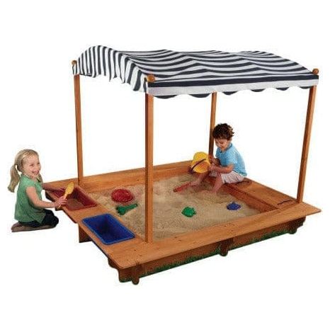 children playing in KidKraft Outdoor Sandbox with Canopy