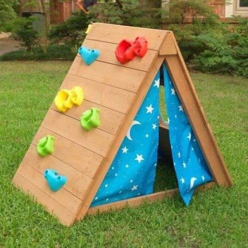 KidKraft A-Frame Hideaway & Climber with climbing wall on lawn