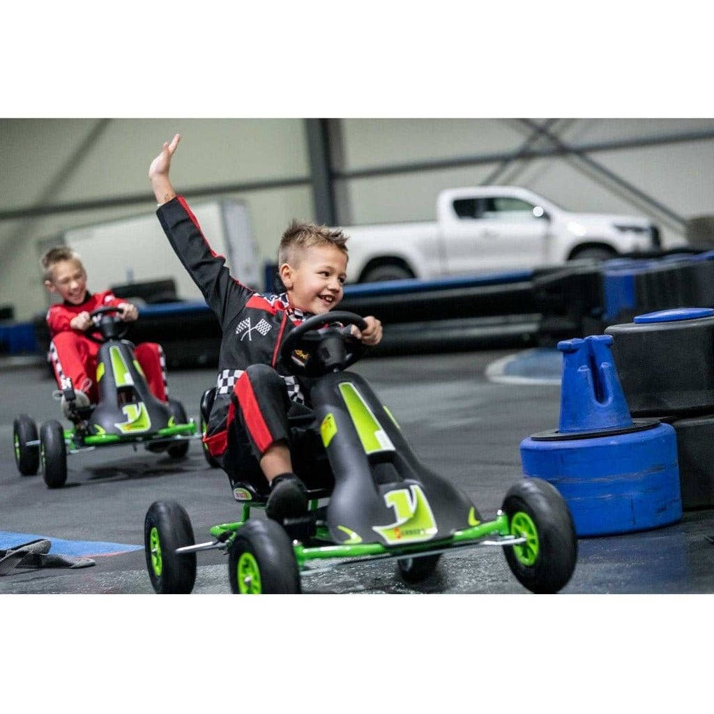 boy with arm in air driving Ferbedo AR8G Go Kart  in black and green