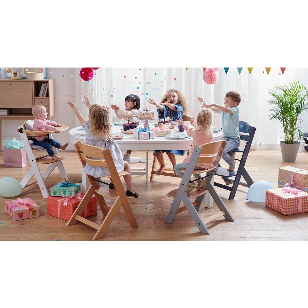 6 children sitting at dinner table on Kinderkraft Enock High Chairs