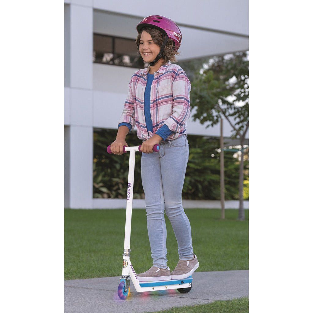 girl riding Razor Electric Party Pop 10.8V Lithium-ion Scooter  on pavement