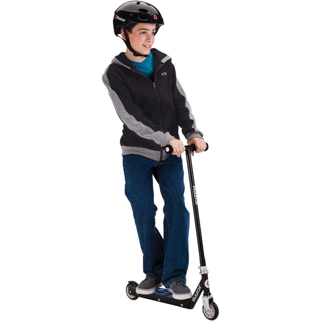 boy standing on Razor Electric Tekno 10.8V Lithium-ion Scooter - Black