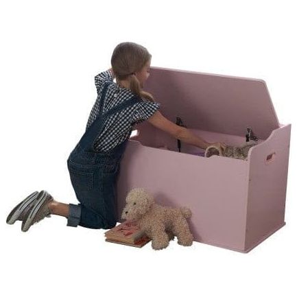 girl getting toys out of KidKraft Austin Toy Box - Pink